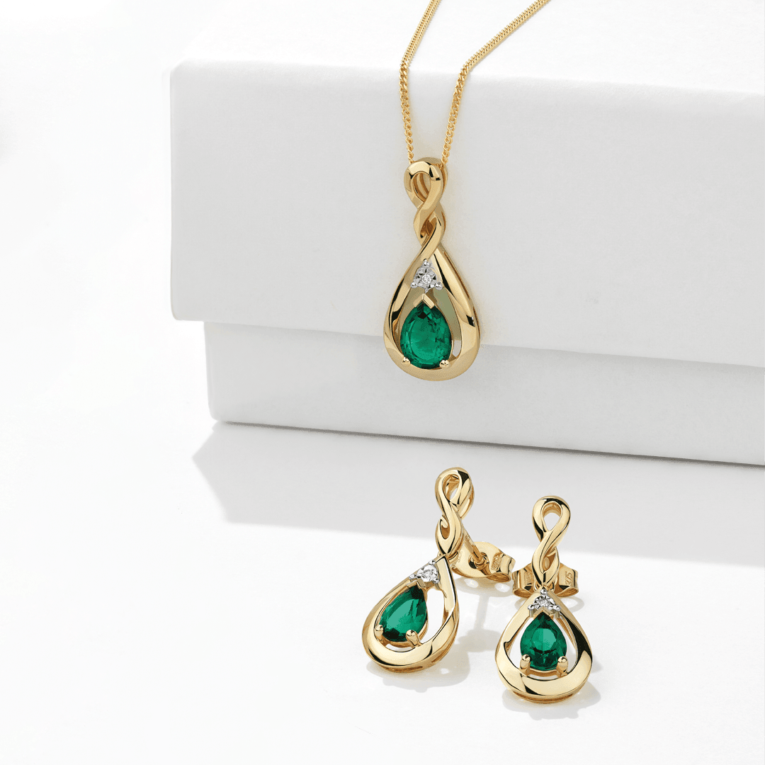 Emerald & Diamond Twist Pear Shape Drop Earrings in 9ct Yellow Gold